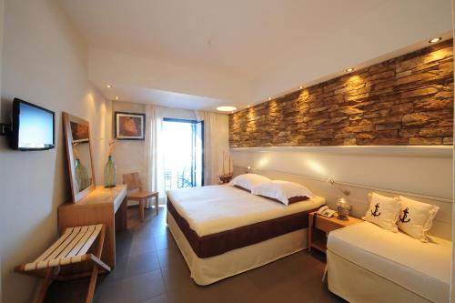 Gallery image of Vrahos Boutique Hotel in Karavostasi