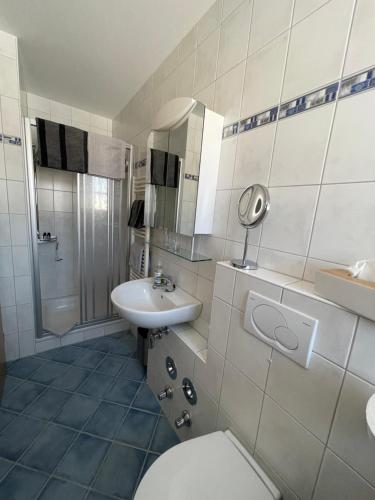 Ένα μπάνιο στο Ferienwohnung Oswald