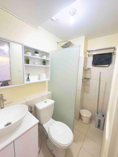 a bathroom with a toilet and a sink and a shower at Condo For Rent in Ortigas (KIMEA Deluxe) in Manila