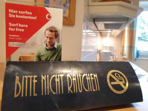 a sign that reads bite night rutherford on a table at Rosenhus 3 in Horumersiel
