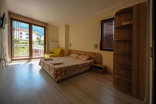 Postel nebo postele na pokoji v ubytování Guest House Vessyta