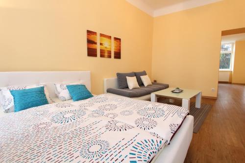 Postel nebo postele na pokoji v ubytování Hotel Klimt