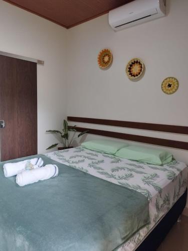 En eller flere senge i et værelse på Casa Carauarí