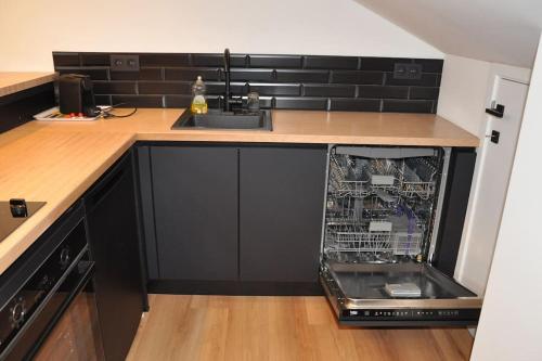 Η κουζίνα ή μικρή κουζίνα στο Magnifique logement, 2 chambres,