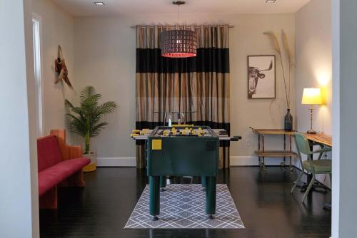 a living room with a table with legos on it at Beautiful Historic Downtown Pensacola Charmer - Hot Tub in Pensacola