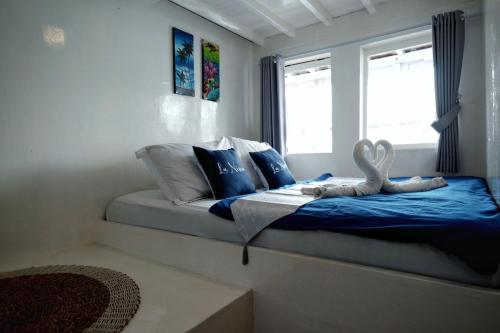 Ένα ή περισσότερα κρεβάτια σε δωμάτιο στο Phinisi sailing Komodo 3 days 2 night