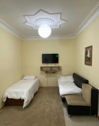 TV a/nebo společenská místnost v ubytování Hostel Apart