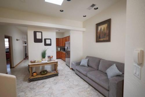 a living room with a couch and a table at *20% New Listing Discount! Tramway Home By Sandias in Albuquerque