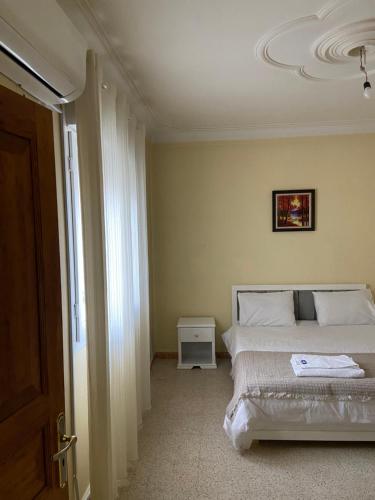 Postel nebo postele na pokoji v ubytování Hostel Apart