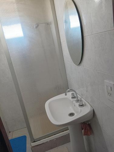 a bathroom with a sink and a mirror at Donde la Zulema in Malargüe