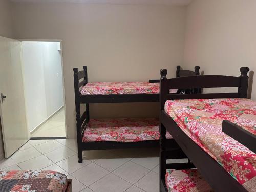 Katil atau katil-katil dalam bilik di Residencial Gomes