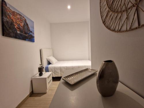 Ένα ή περισσότερα κρεβάτια σε δωμάτιο στο MALVASIA 4