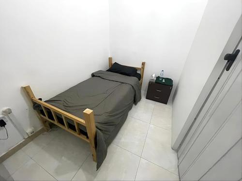 Postel nebo postele na pokoji v ubytování Corniche AD - Nicely Room