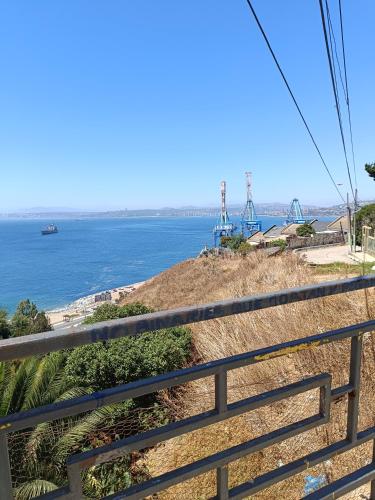 a view of the ocean from a bluff at Hostal Tulio Porteño in Valparaíso