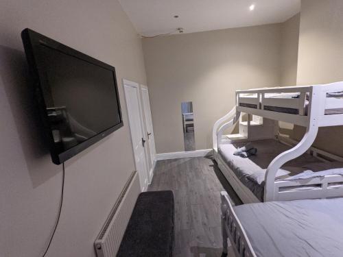 Cama ou camas em um quarto em Kop View