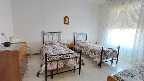 Postel nebo postele na pokoji v ubytování Savena House
