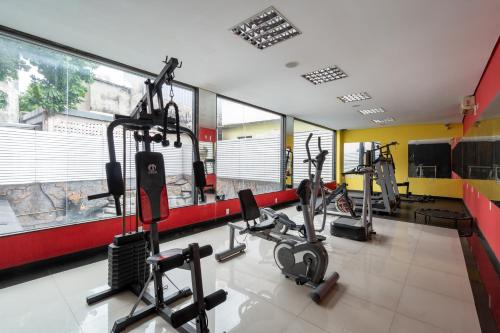 a gym with several treadmills and cardio machines at Rede Andrade Amazônia in Manaus