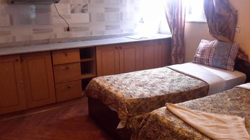 Postel nebo postele na pokoji v ubytování Piassa Hotel