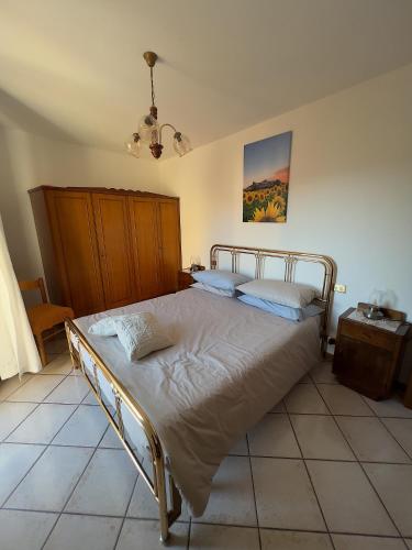 Ein Bett oder Betten in einem Zimmer der Unterkunft Terrazza Sul Borghetto