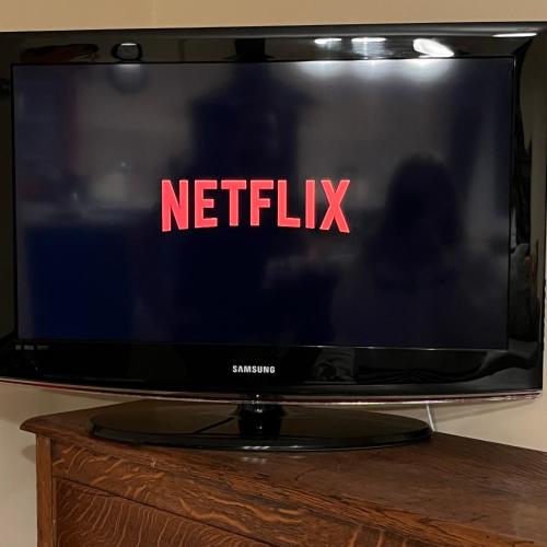 a television with the netflix logo on the screen at Southsea, Portsmouth - Two Bedroom Apartment - Newly Refurbished Throughout - Treetop Sea Views in Portsmouth