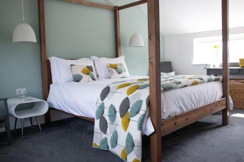 Giường trong phòng chung tại Barn Lane @ Drumagosker Rural Retreats