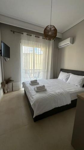 Katil atau katil-katil dalam bilik di Tinyhug Apartment