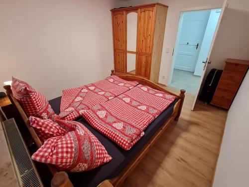Ένα ή περισσότερα κρεβάτια σε δωμάτιο στο Ferienwohnung Freymiller