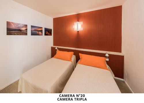 Postel nebo postele na pokoji v ubytování Al mare (Guesthouse)
