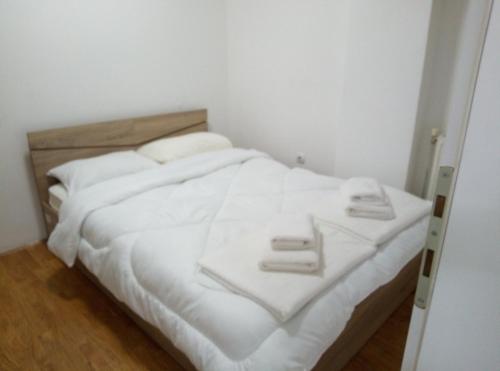 Säng eller sängar i ett rum på Primo Classe Apartment 4
