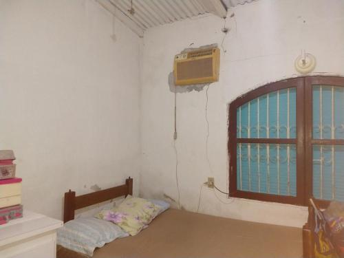 Postelja oz. postelje v sobi nastanitve Aconchego