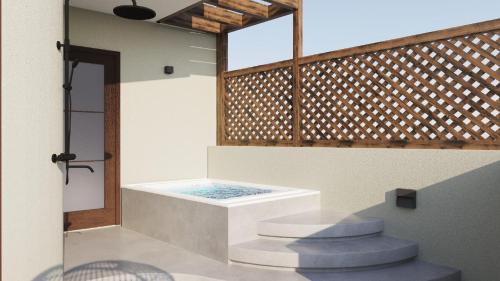 Megálon ChoríonにあるUtopia Luxury Resortのバスルーム(バスタブ、シャワー付)が備わります。