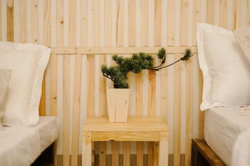 Ένα ή περισσότερα κρεβάτια σε δωμάτιο στο Pallet Homes - Megaworld