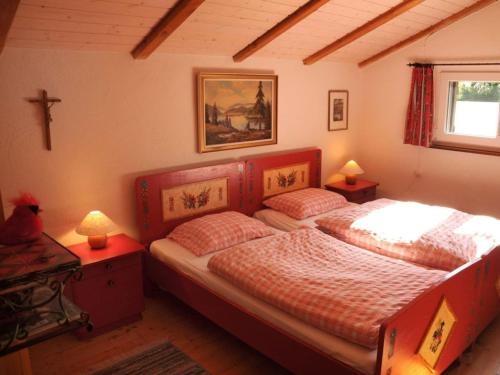 Giường trong phòng chung tại Holiday home Feldbergblick