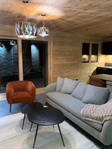 Posezení v ubytování Superbe chalet avec vue montagne