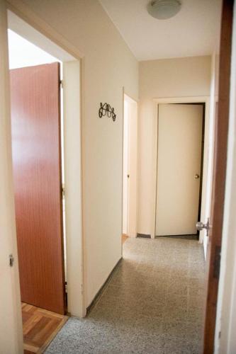 an empty room with a hallway with two doors at Gran Hotel Uruguay in Salto
