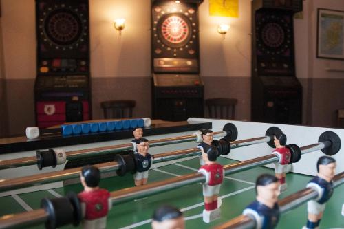 a group of miniature people playing a game of pool at Hajo´s Germania Lodge & Irish Pub in Rüdesheim am Rhein