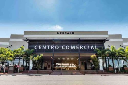 a store front of a generico commercial building at Casa com piscina em condomínio ensolarada! in Santa Bárbara do Rio Pardo