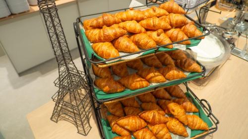 a display of trays of food on a table at Toyoko Inn Osaka Yodoyabashi-eki Minami in Osaka