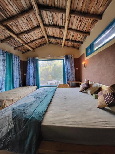 Postel nebo postele na pokoji v ubytování Zenoaks Homestay