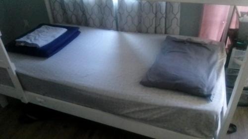 Cama ou camas em um quarto em Robertson's Place Like Home