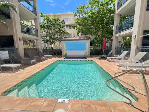 a swimming pool in the middle of a building at Montego Sands Resort in Gold Coast