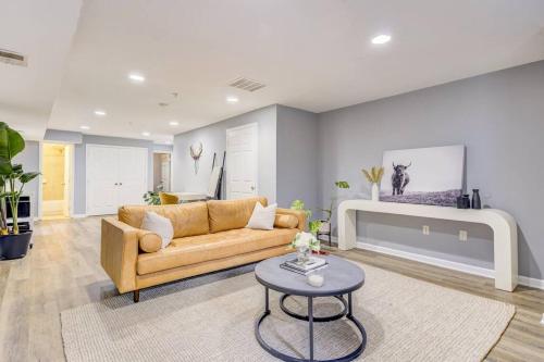 a living room with a couch and a table at Spacious Suite in Deanwood + Free Parking in Washington, D.C.