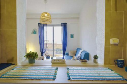 Ένα ή περισσότερα κρεβάτια σε δωμάτιο στο Iodio Studio - Cozy home with pool