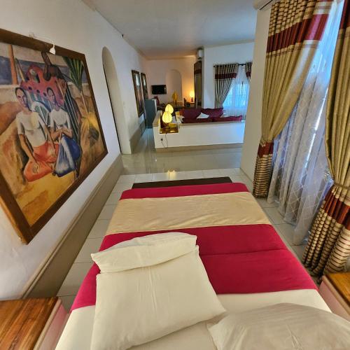 a bedroom with two beds in a room at Ella Planters Bungalow in Ella