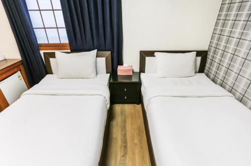 Postel nebo postele na pokoji v ubytování Nokwon Motel