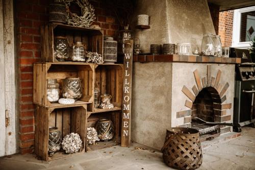 a room with a brick wall with a brick oven at Villa Knoche in Arnsberg