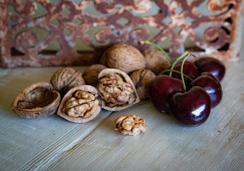 a pile of different types of nuts on a table at About Thyme for Sleeps & Treats in Alexandra