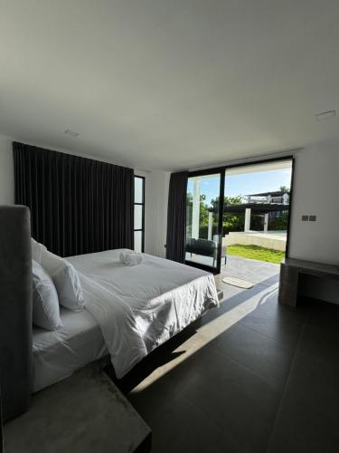Ένα ή περισσότερα κρεβάτια σε δωμάτιο στο Villa Valeria