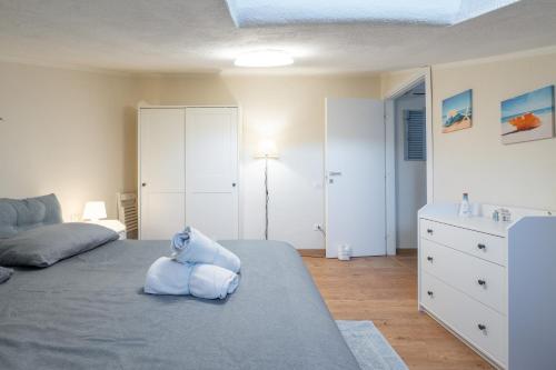 Postel nebo postele na pokoji v ubytování Al Chiaro di Luna