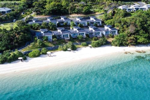 an aerial view of a resort on the beach at Miru Amami in Tatsugo